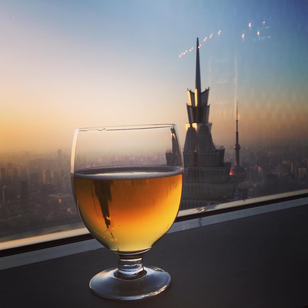 Chinese beer with a good view. #shanghai #skyscraper #beer